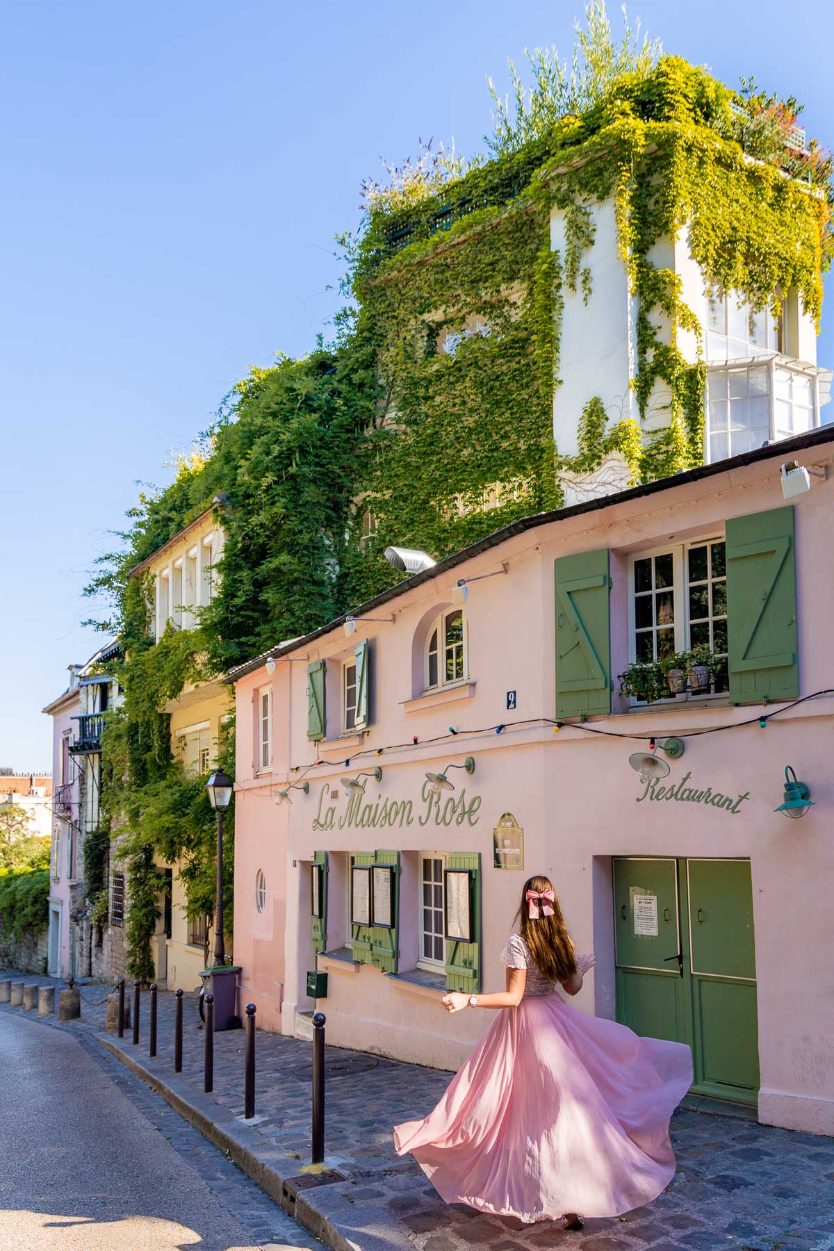 Girl in front of La Maison Rose, Paris