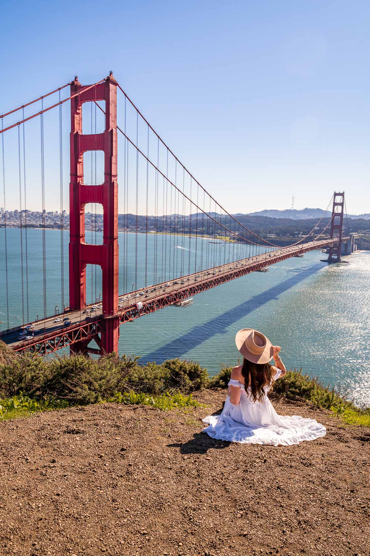 Girl in white dress at Battery Spencer, one of the best Instagram spots in San Francisco