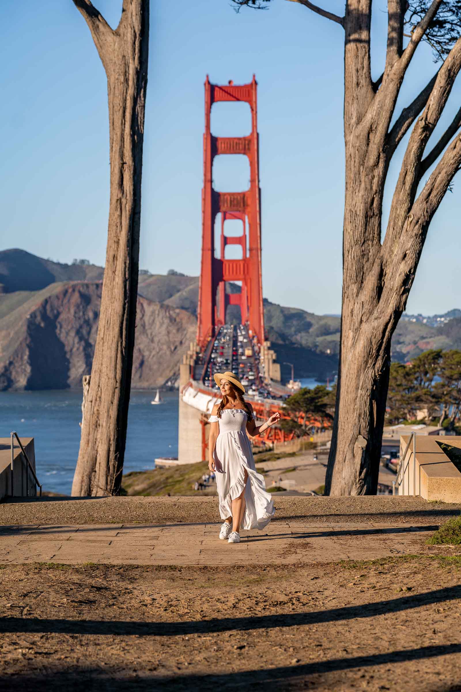 Girl in white dress at the Golden Gate Overlook in San Francisco