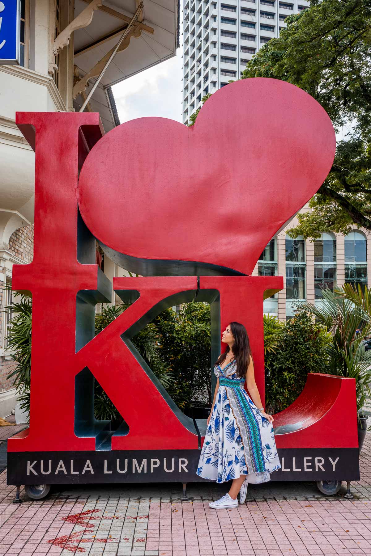 Girl standing in front of an I Love KL Sign at the Kuala Lumpur City Gallery