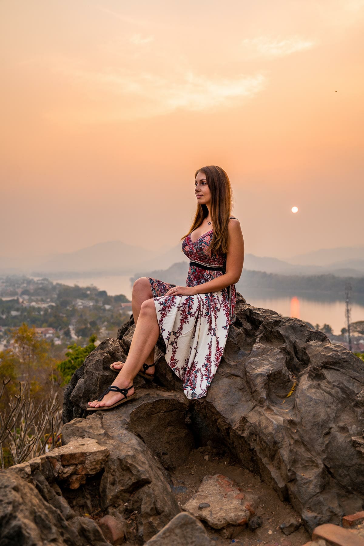 Girl on top of Mount Phu Si in Luang Prabang, Laos