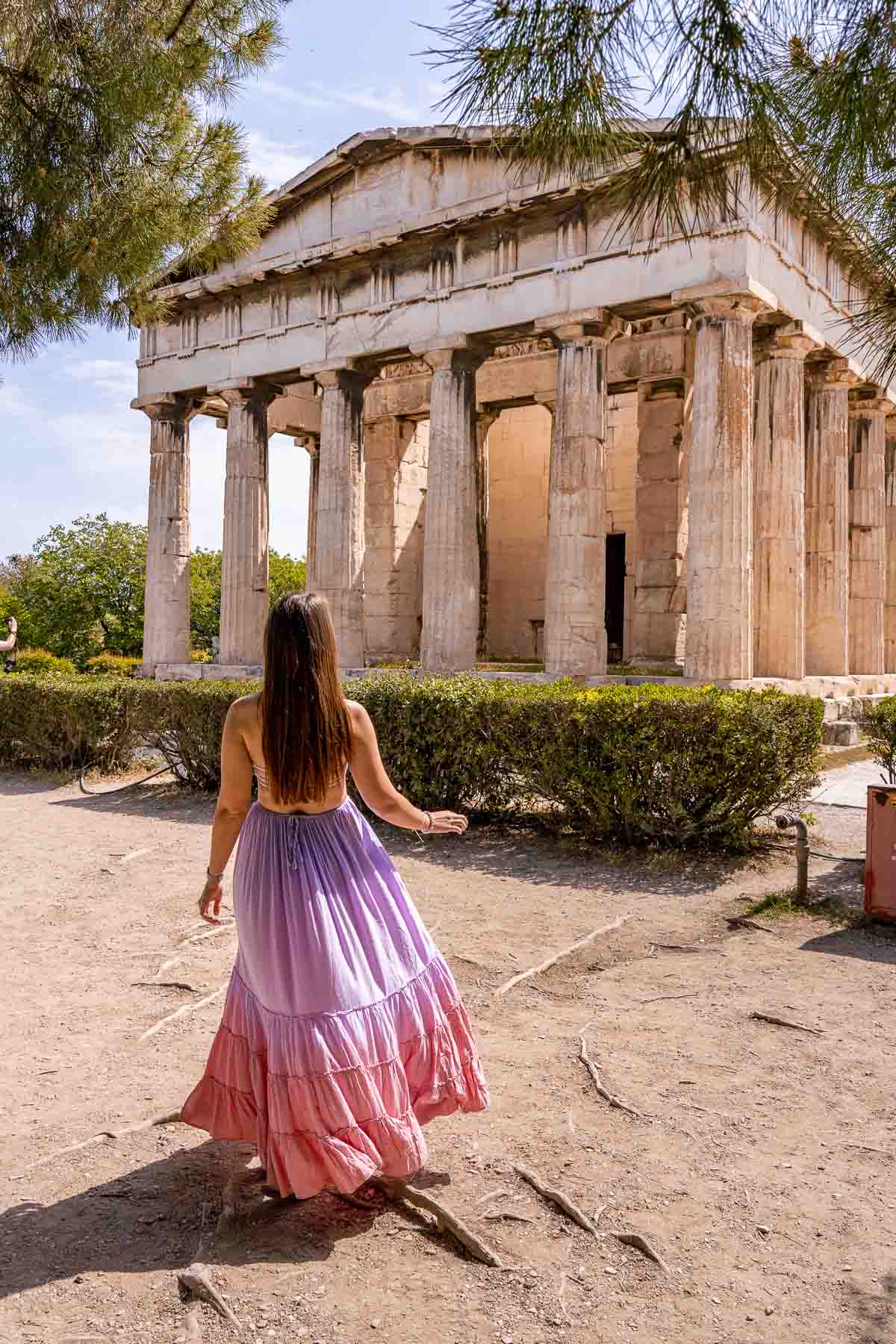 Girl in front of Temple of Hephaestus in the Ancient Agora, Athens