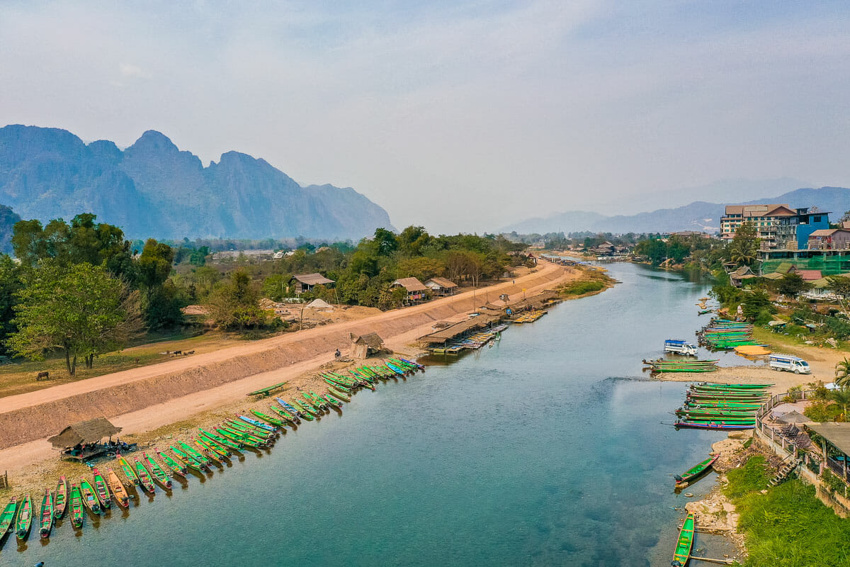 Long-tail boats along the Nam Song River in Vang Vieng, Laos