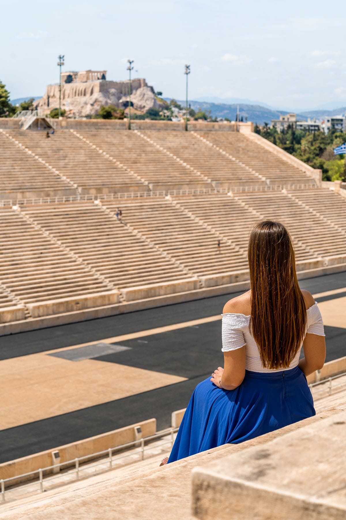 Girl sitting at the Panathenaic Stadium, Athens
