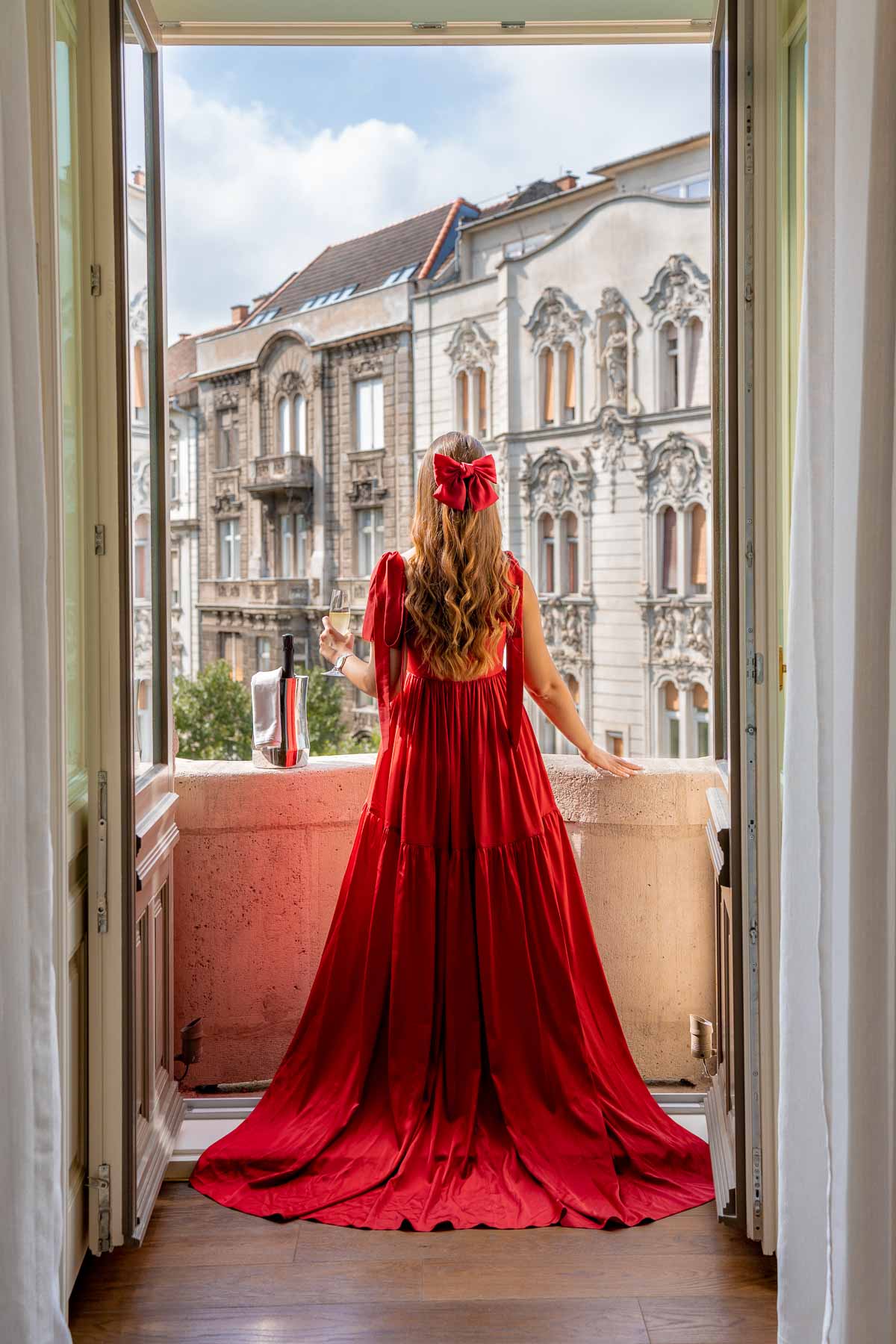Girl on a balcony at Matild Palace