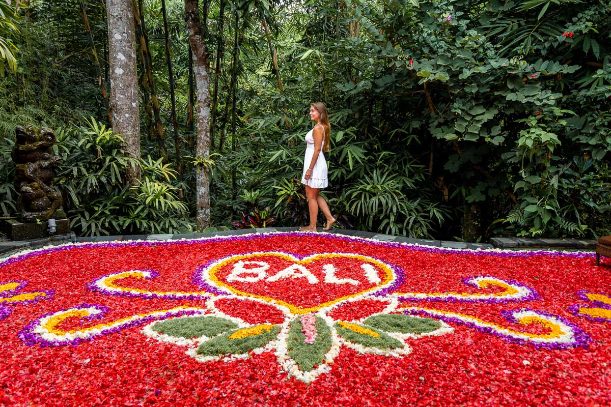 Girl standing at the edge of a Flower Pool at The Udaya