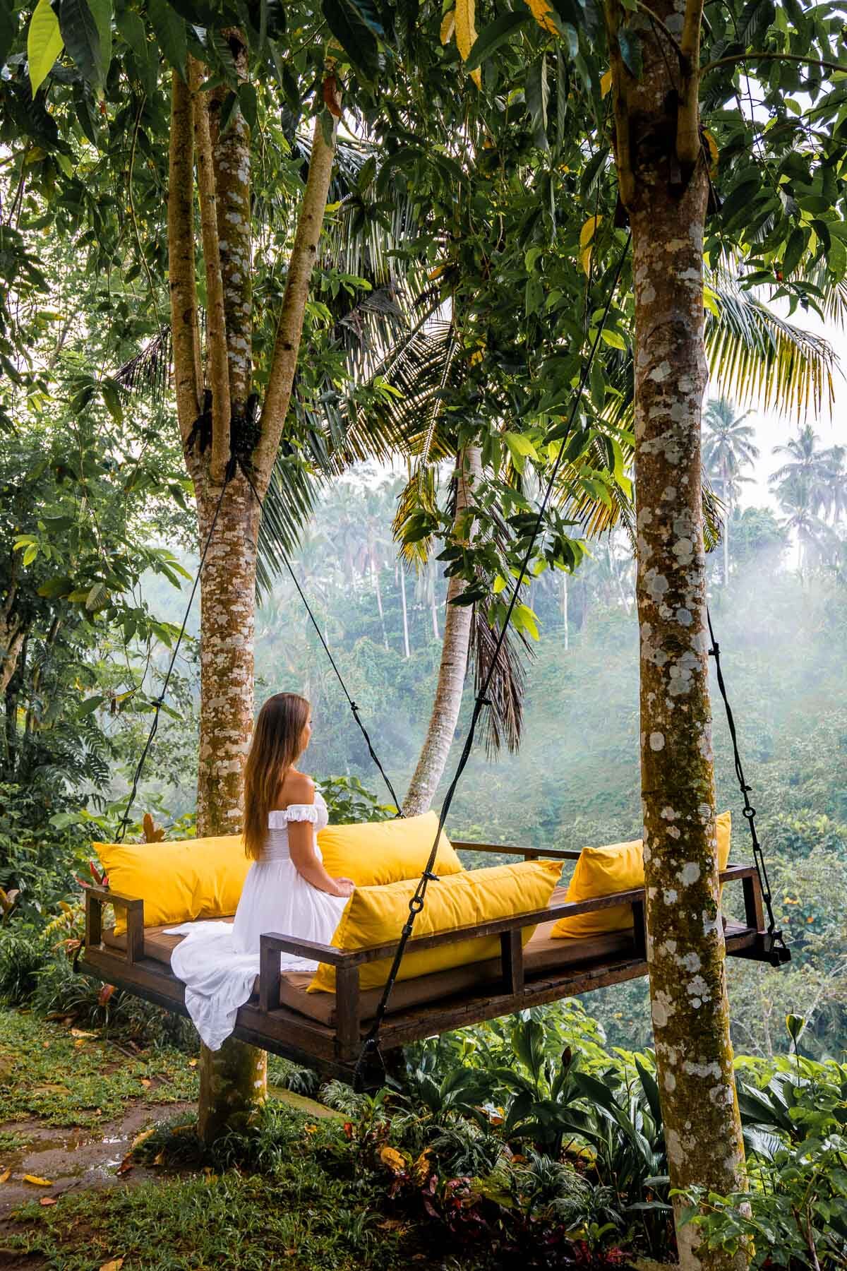 Girl on the Forest swing at Kamandalu Ubud