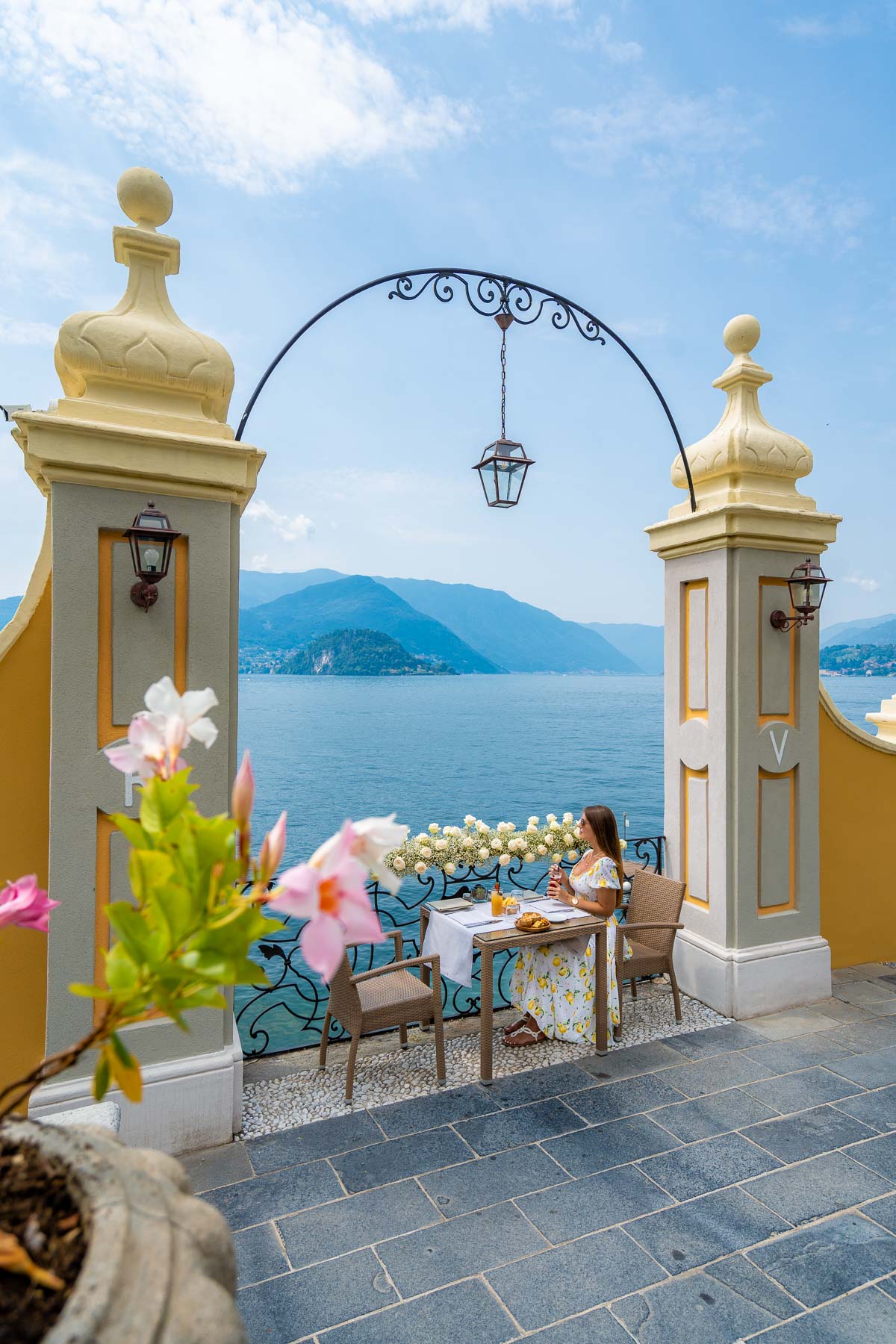 Girl sitting at Bar Giardino at Hotel Royal Victoria in Varenna, Lake Como