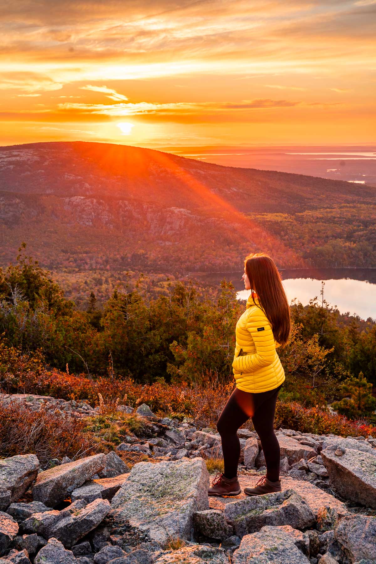 Girl watching the Sunset from Cadillac Mountain in Acadia National Park