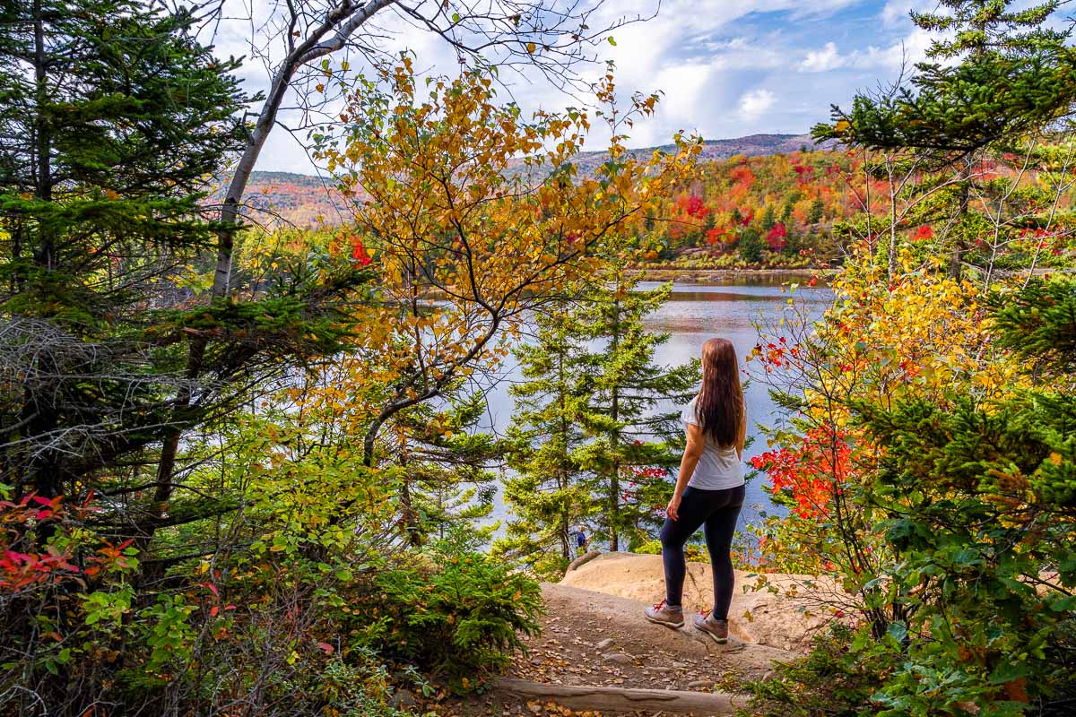 Girl in front of The Bowl in Acadia National Park