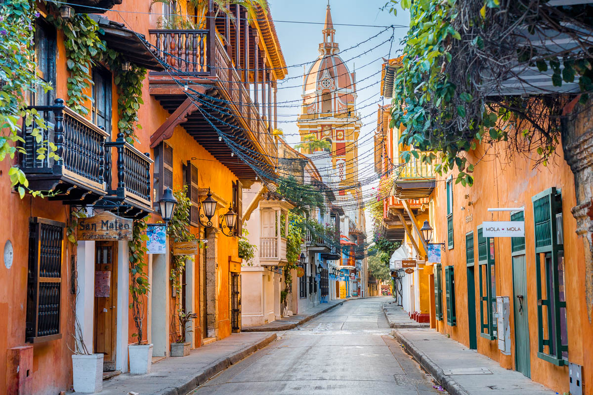 Colorful street with a view of Catedral de Santa Catalina de Alejandria, Cartagena