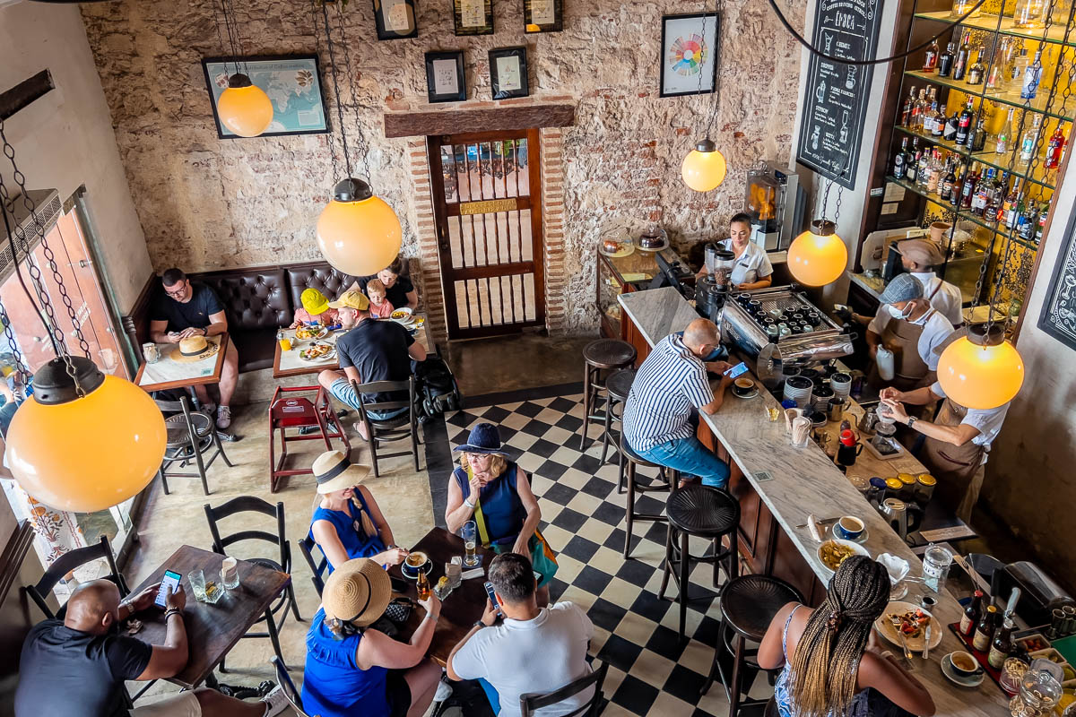 Indoor tables at Epoca Cafe Bar, Cartagena