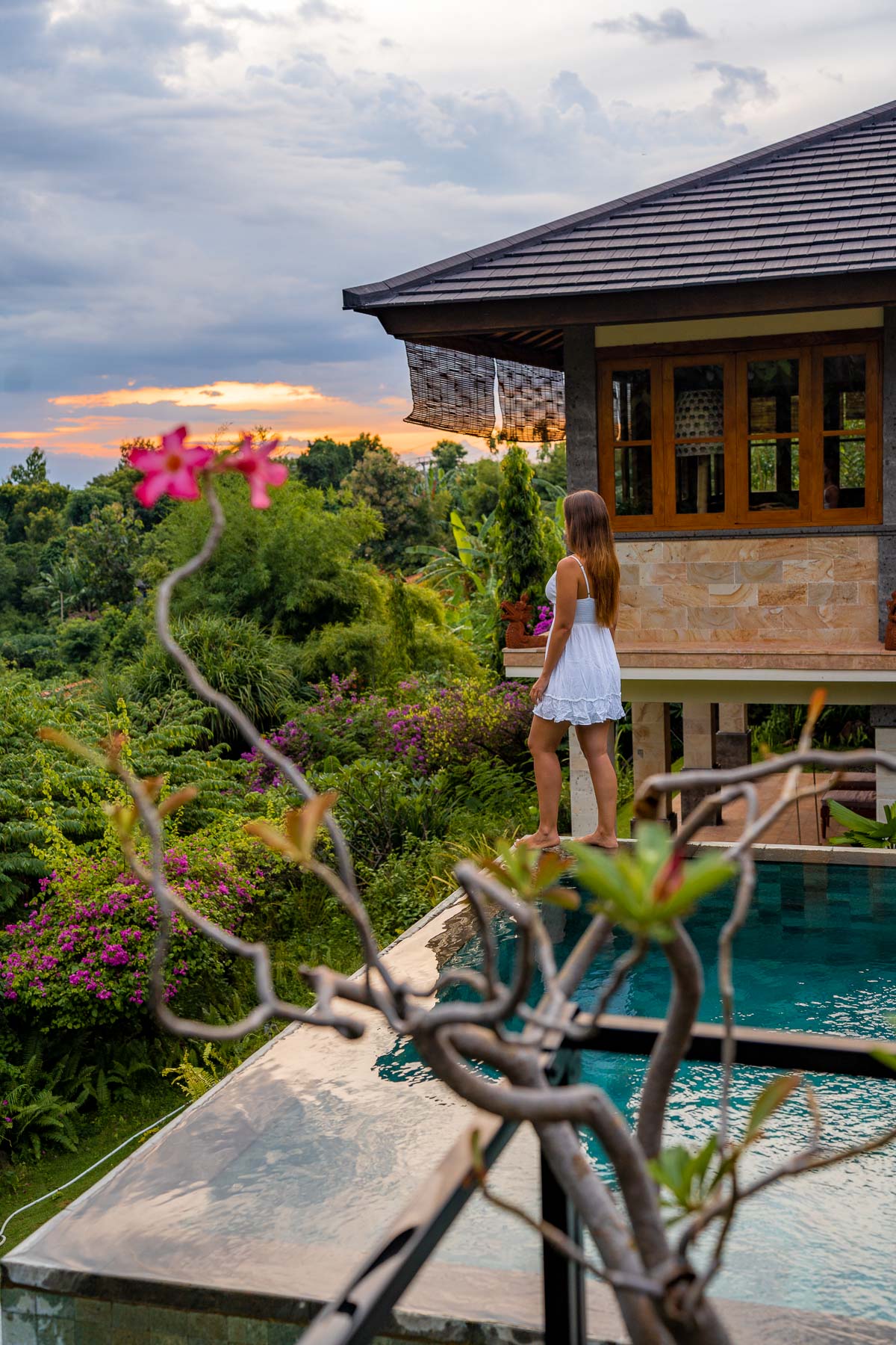 Girl by the infinity pool at Villa Naga at Sumberkima Hill Retreat Bali