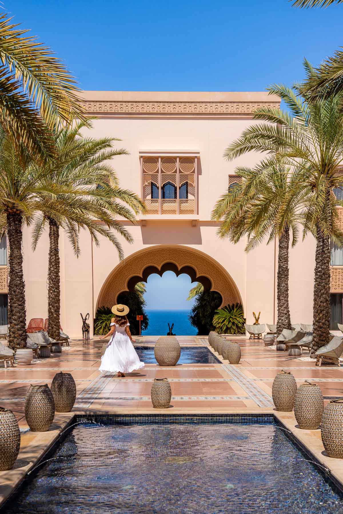 Girl at the courtyard at Shangri-La Al Husn