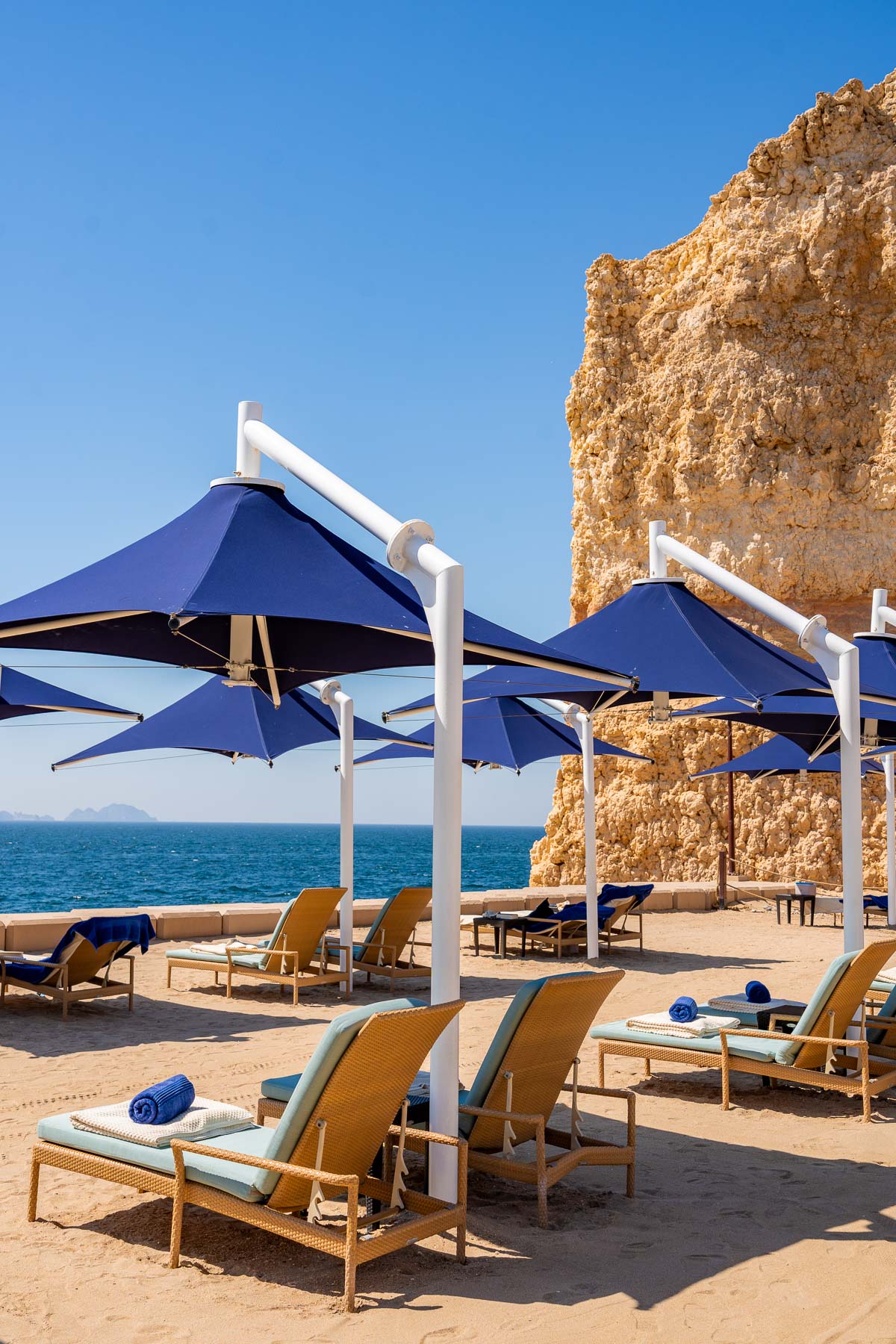 Sun loungers on the private beach at Shangri-La Al Husn
