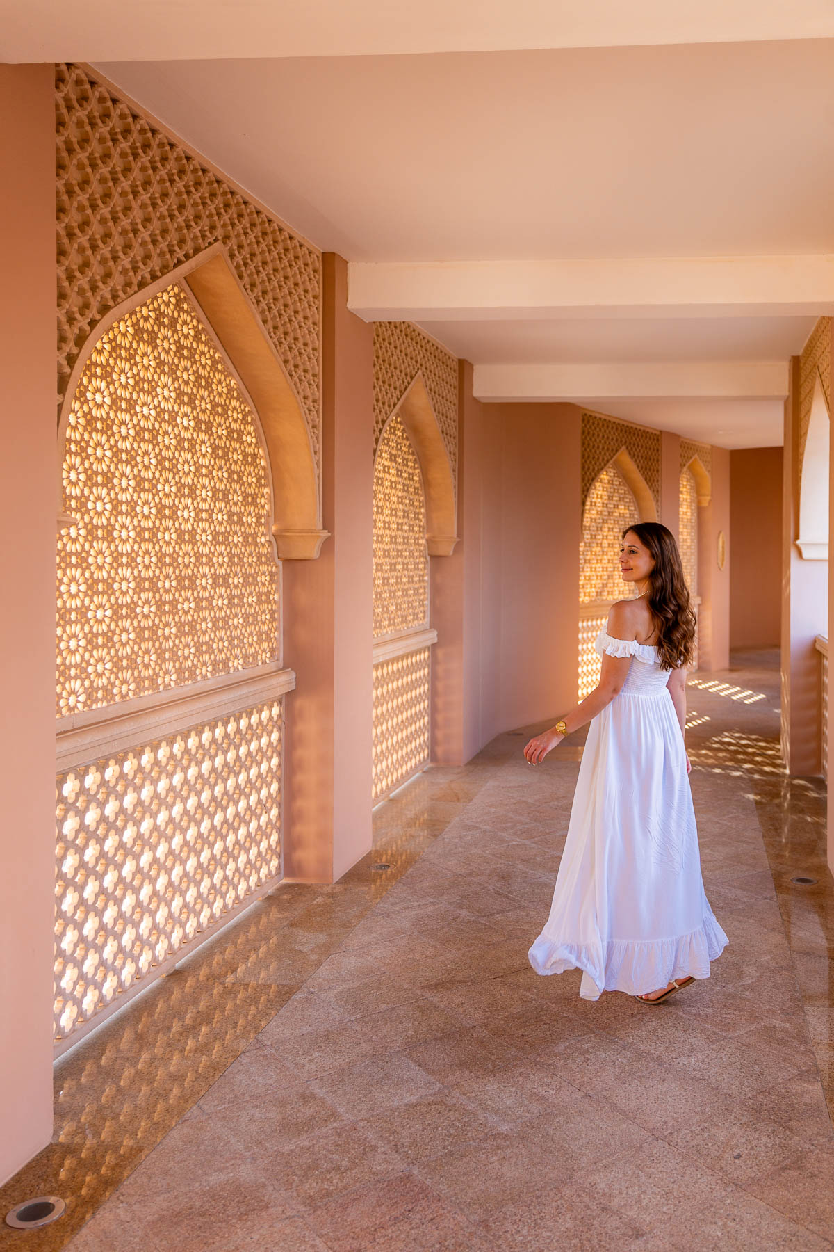 Girl on a hallway at Shangri-La Al Husn