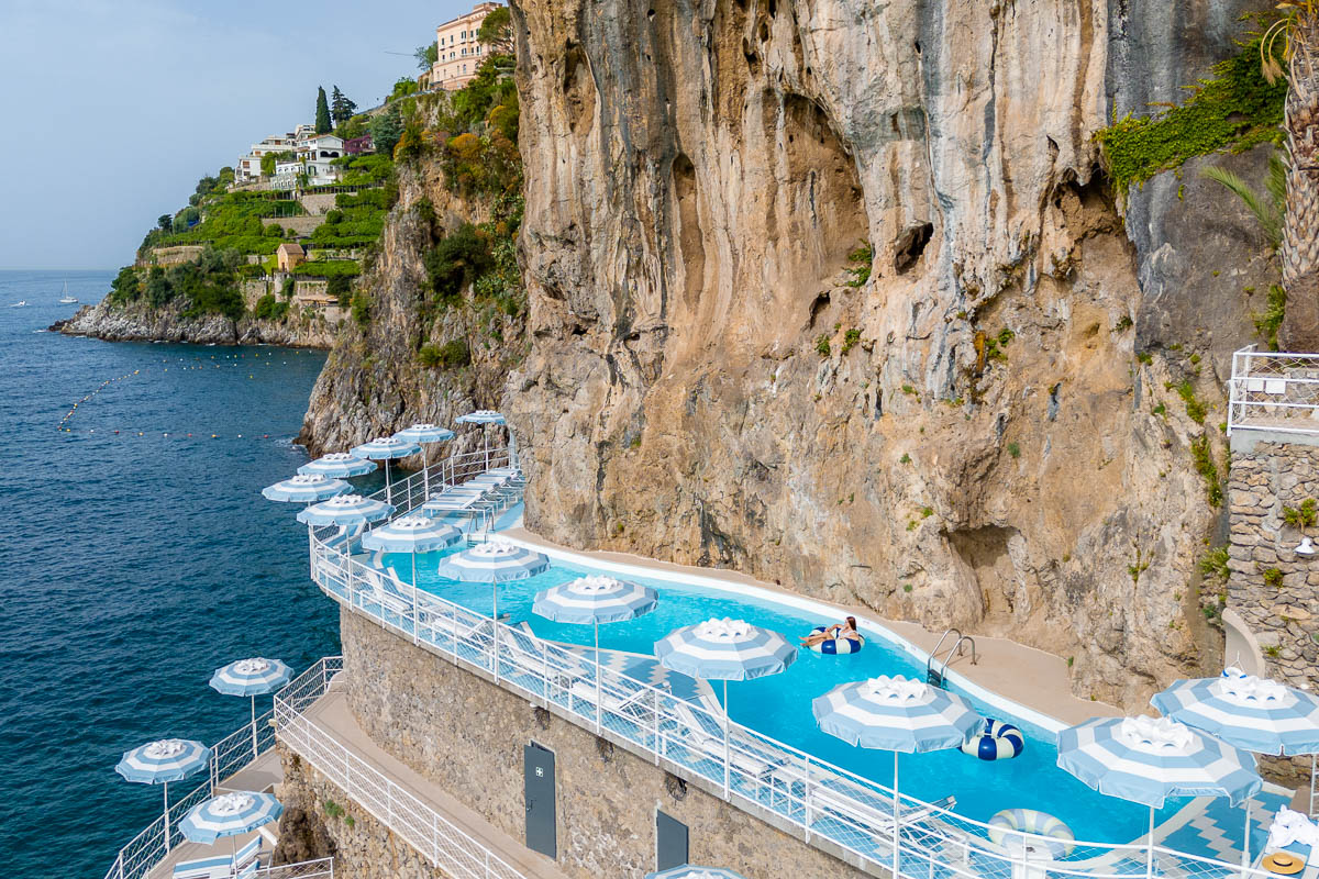 Drone photo of the cliffside pool at Hotel Miramalfi
